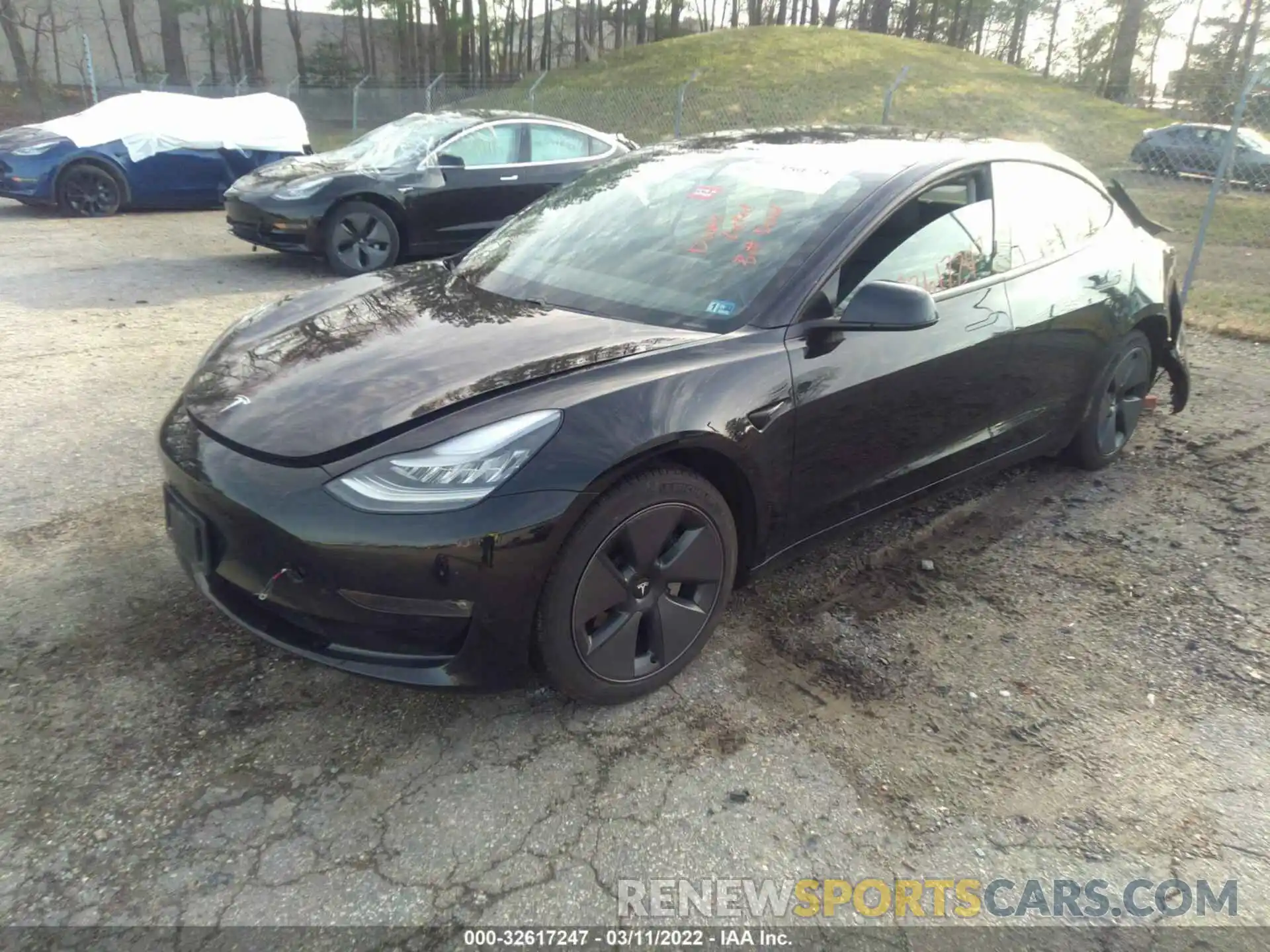 2 Photograph of a damaged car 5YJ3E1EB5MF855234 TESLA MODEL 3 2021