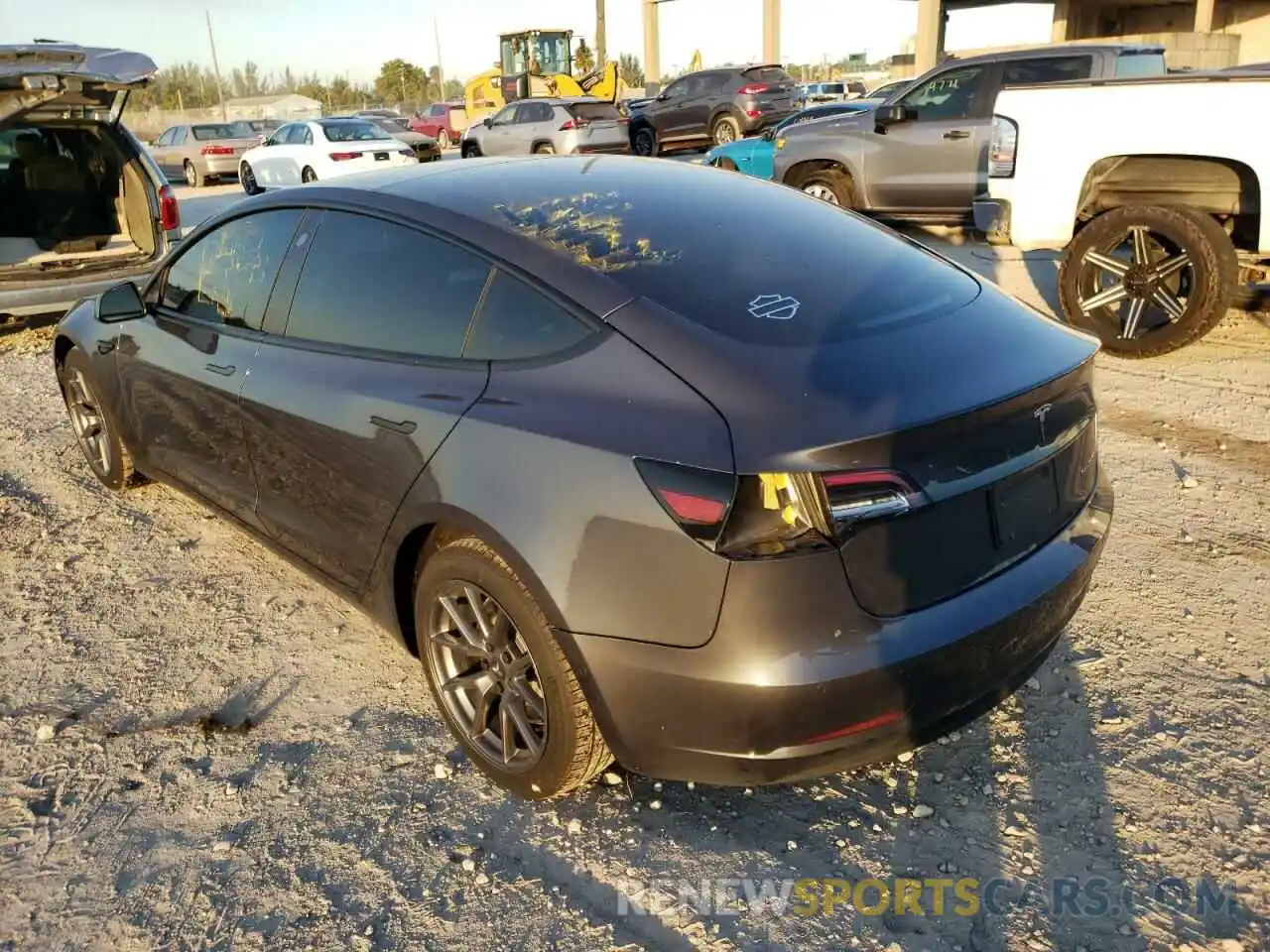 3 Photograph of a damaged car 5YJ3E1EB5MF855850 TESLA MODEL 3 2021