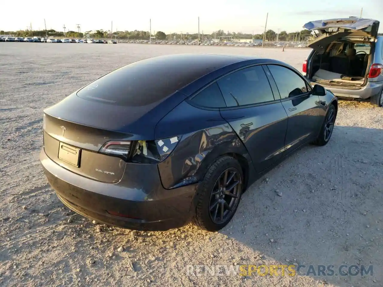 4 Photograph of a damaged car 5YJ3E1EB5MF855850 TESLA MODEL 3 2021