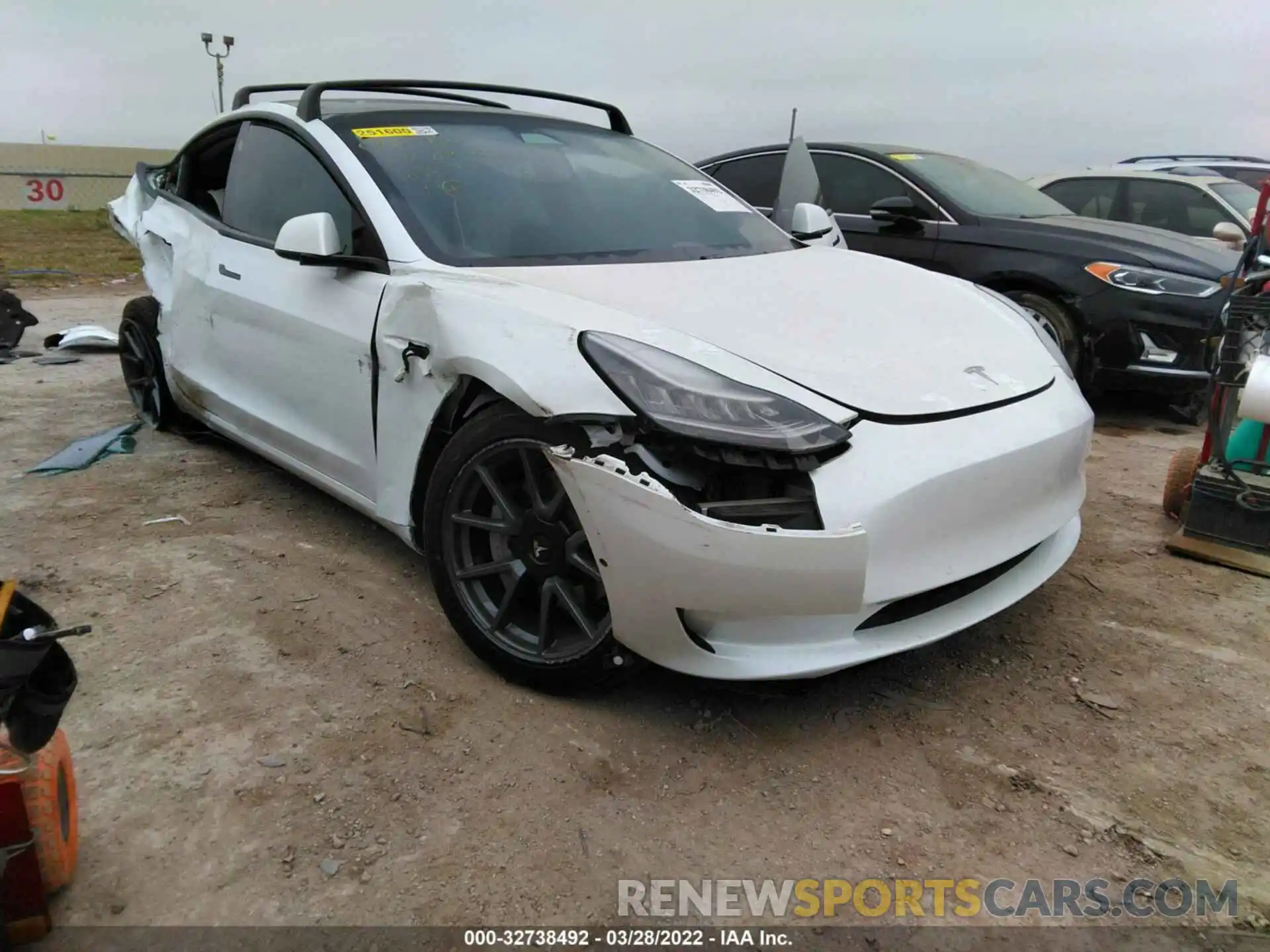 1 Photograph of a damaged car 5YJ3E1EB5MF858599 TESLA MODEL 3 2021