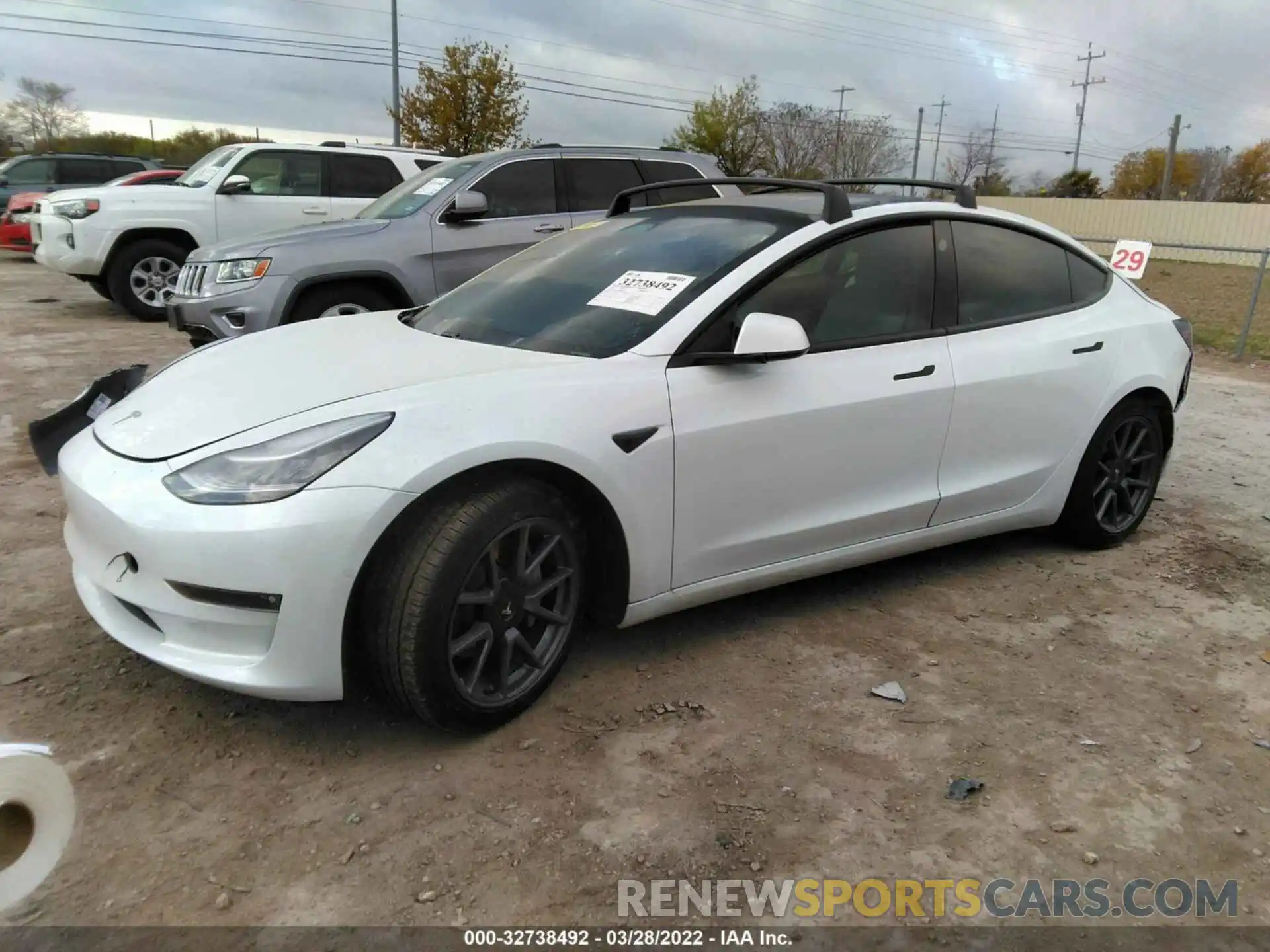 2 Photograph of a damaged car 5YJ3E1EB5MF858599 TESLA MODEL 3 2021