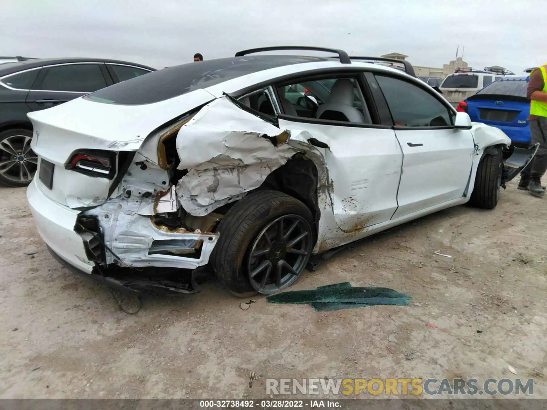 4 Photograph of a damaged car 5YJ3E1EB5MF858599 TESLA MODEL 3 2021