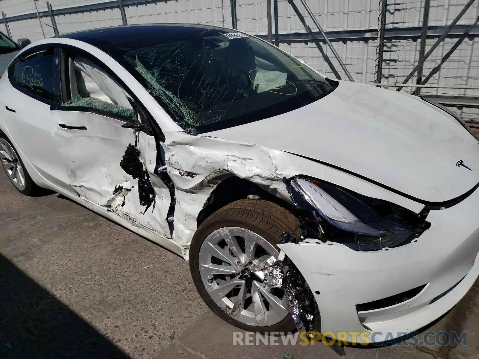 9 Photograph of a damaged car 5YJ3E1EB5MF859817 TESLA MODEL 3 2021