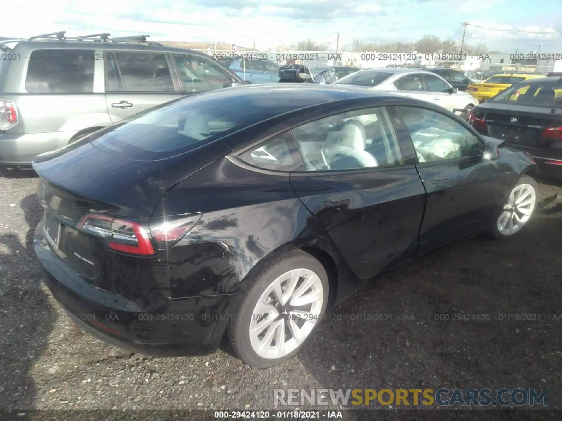 4 Photograph of a damaged car 5YJ3E1EB5MF860417 TESLA MODEL 3 2021