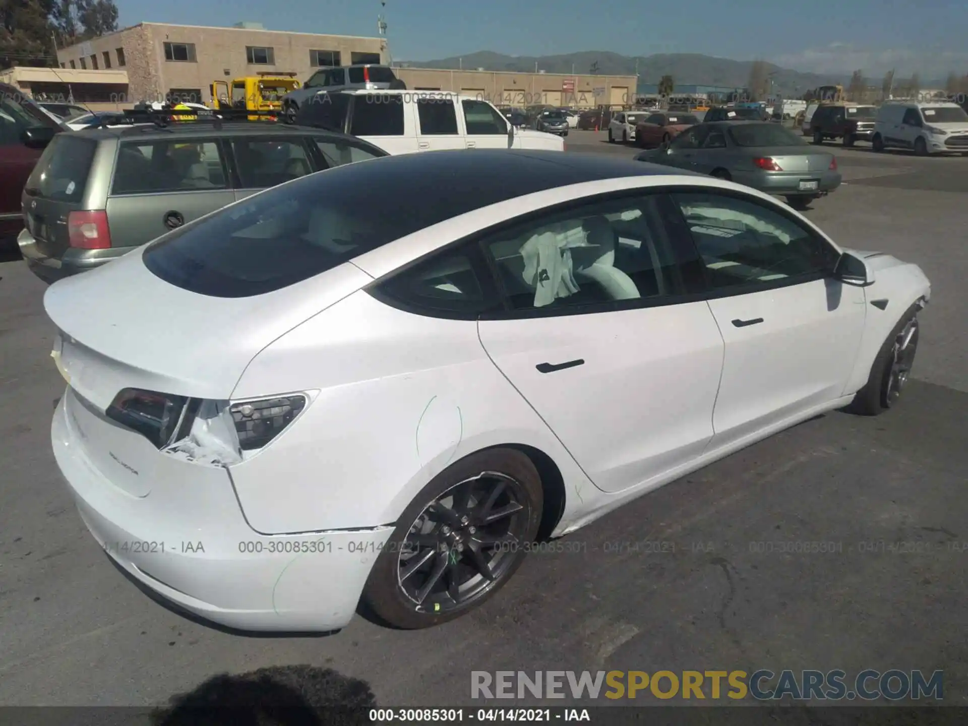 4 Photograph of a damaged car 5YJ3E1EB5MF876181 TESLA MODEL 3 2021