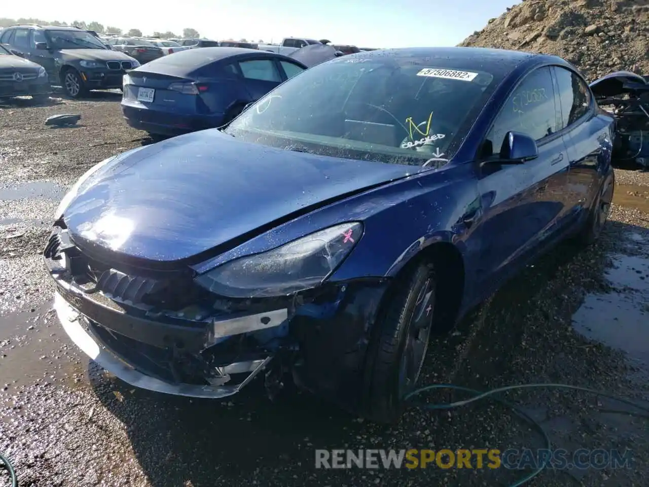 2 Photograph of a damaged car 5YJ3E1EB5MF903007 TESLA MODEL 3 2021