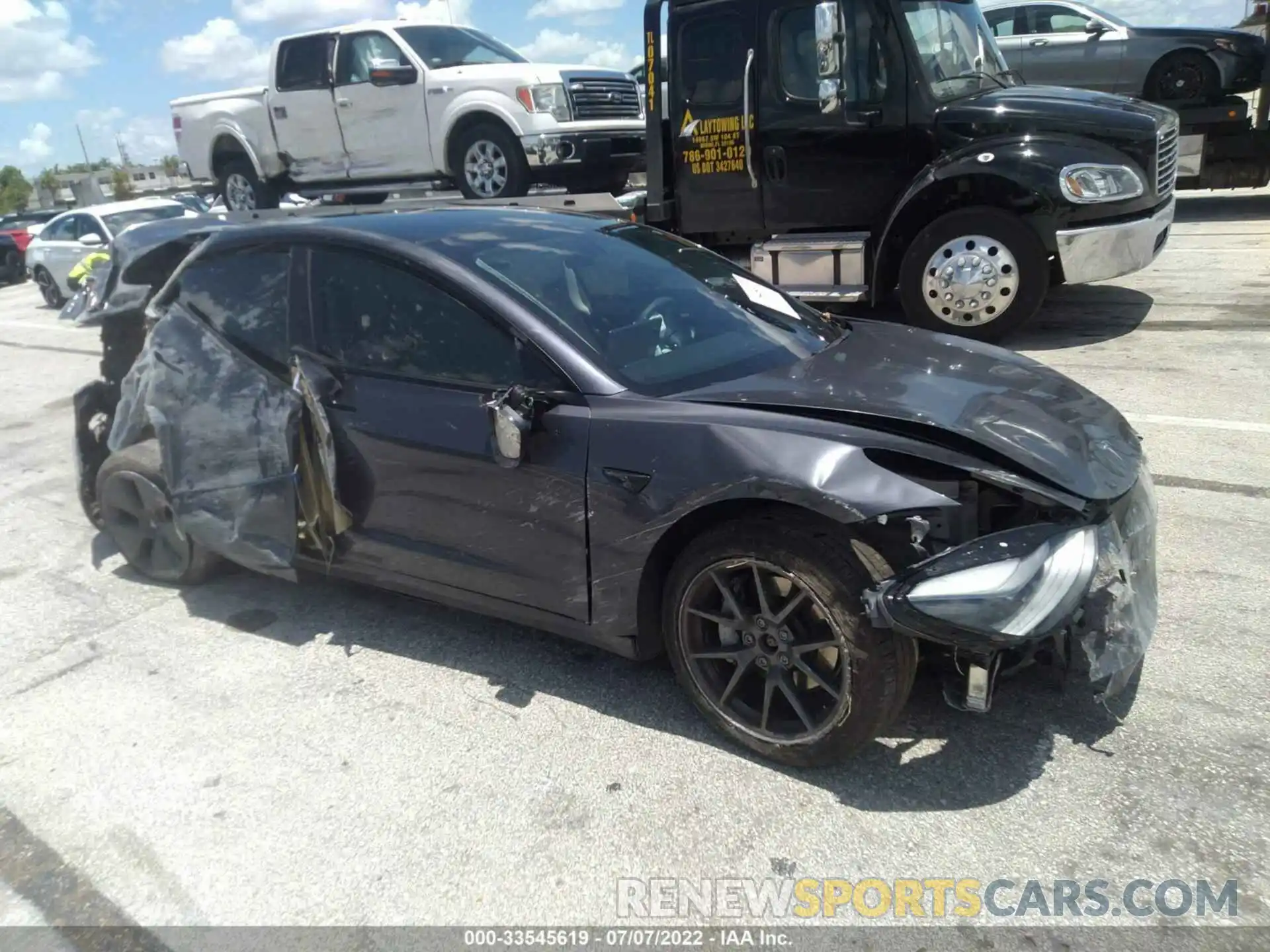 1 Photograph of a damaged car 5YJ3E1EB5MF974420 TESLA MODEL 3 2021