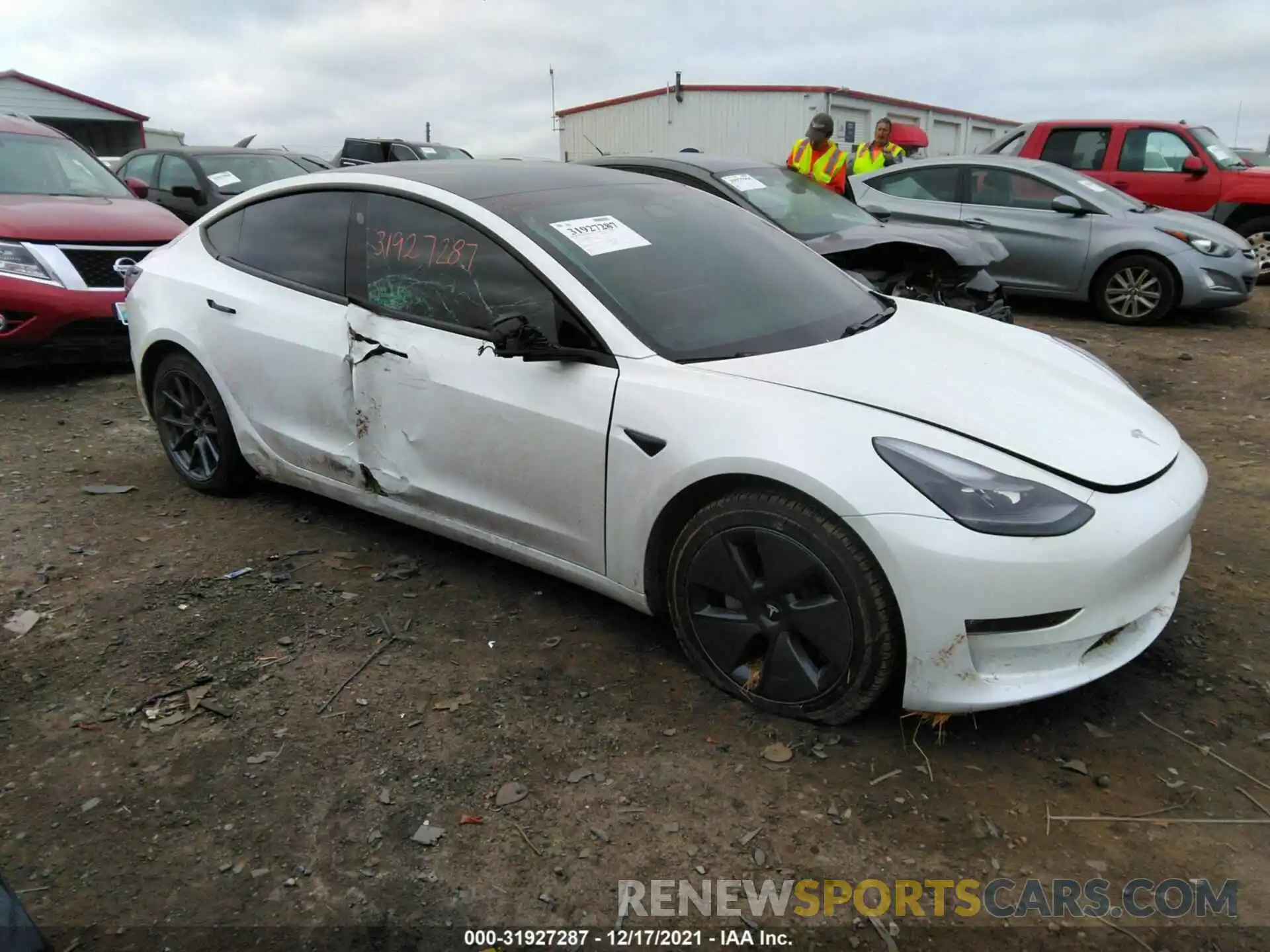 1 Photograph of a damaged car 5YJ3E1EB5MF979990 TESLA MODEL 3 2021