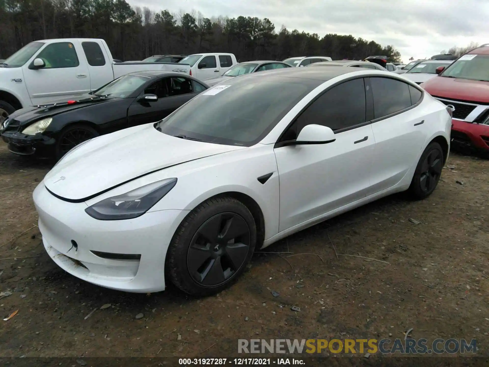 2 Photograph of a damaged car 5YJ3E1EB5MF979990 TESLA MODEL 3 2021