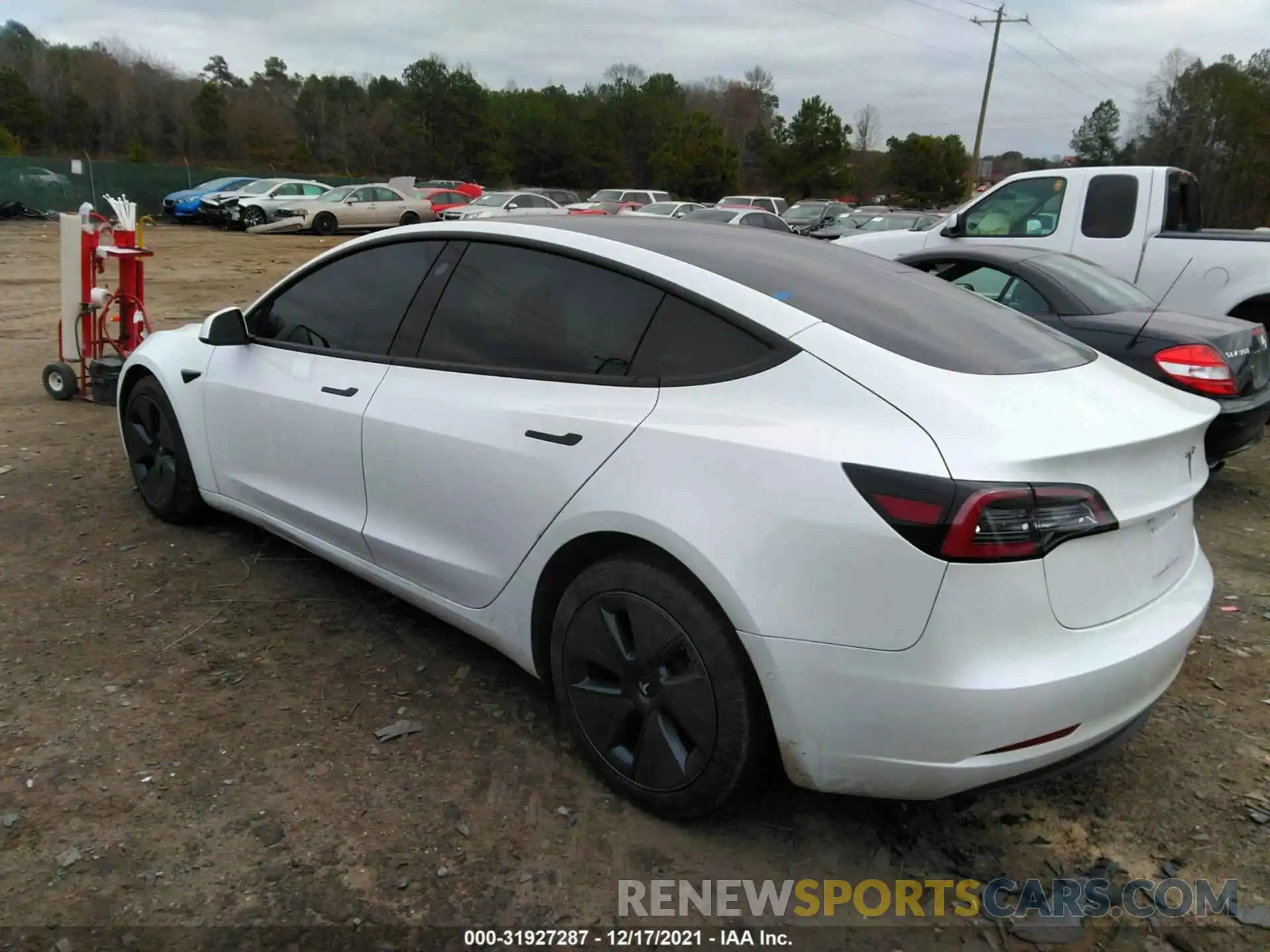 3 Photograph of a damaged car 5YJ3E1EB5MF979990 TESLA MODEL 3 2021