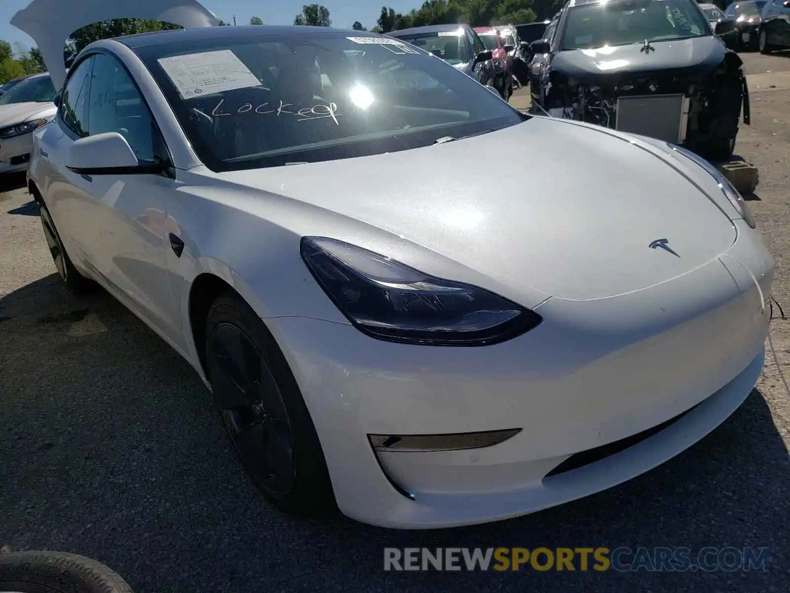 1 Photograph of a damaged car 5YJ3E1EB5MF992755 TESLA MODEL 3 2021