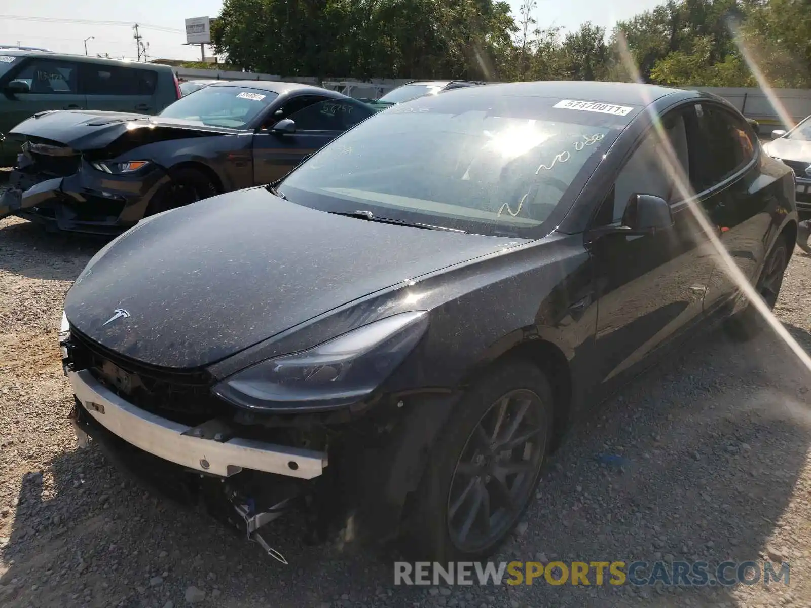 2 Photograph of a damaged car 5YJ3E1EB5MF992836 TESLA MODEL 3 2021