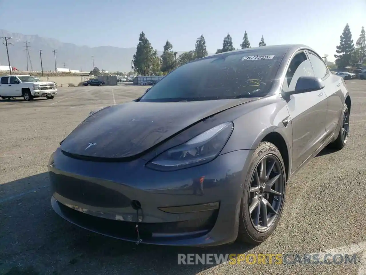 2 Photograph of a damaged car 5YJ3E1EB5MF995817 TESLA MODEL 3 2021