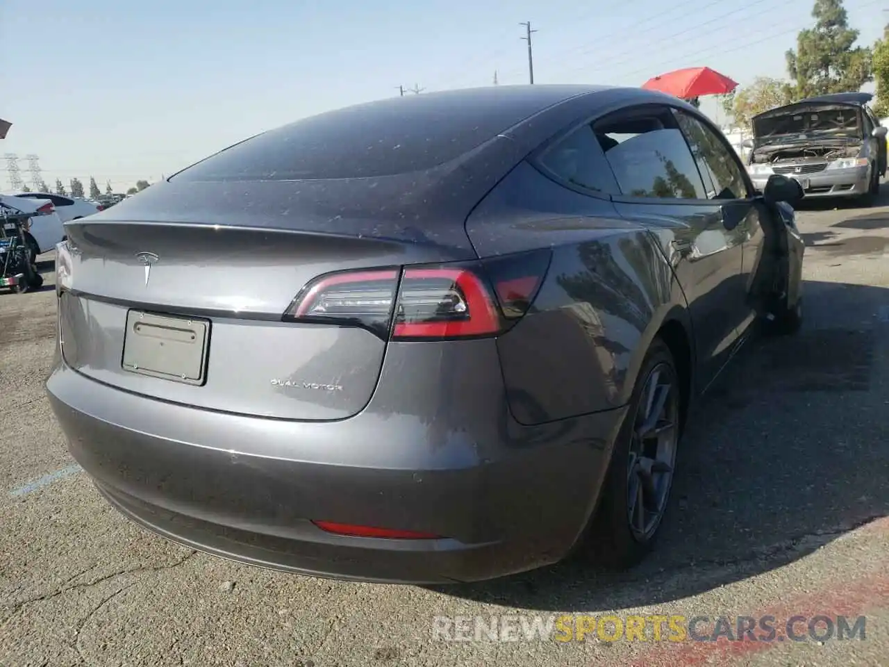 4 Photograph of a damaged car 5YJ3E1EB5MF995817 TESLA MODEL 3 2021