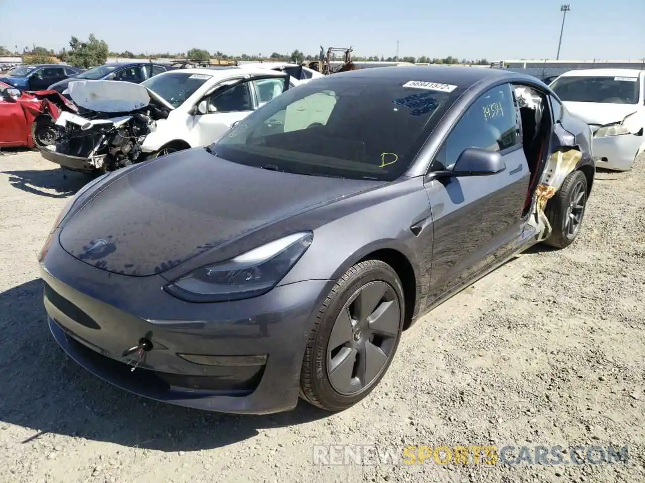 2 Photograph of a damaged car 5YJ3E1EB5MF999043 TESLA MODEL 3 2021