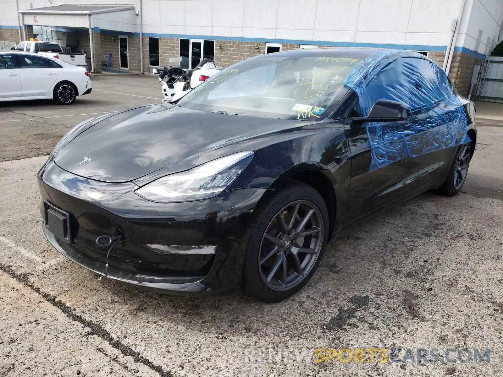 2 Photograph of a damaged car 5YJ3E1EB6MF848955 TESLA MODEL 3 2021