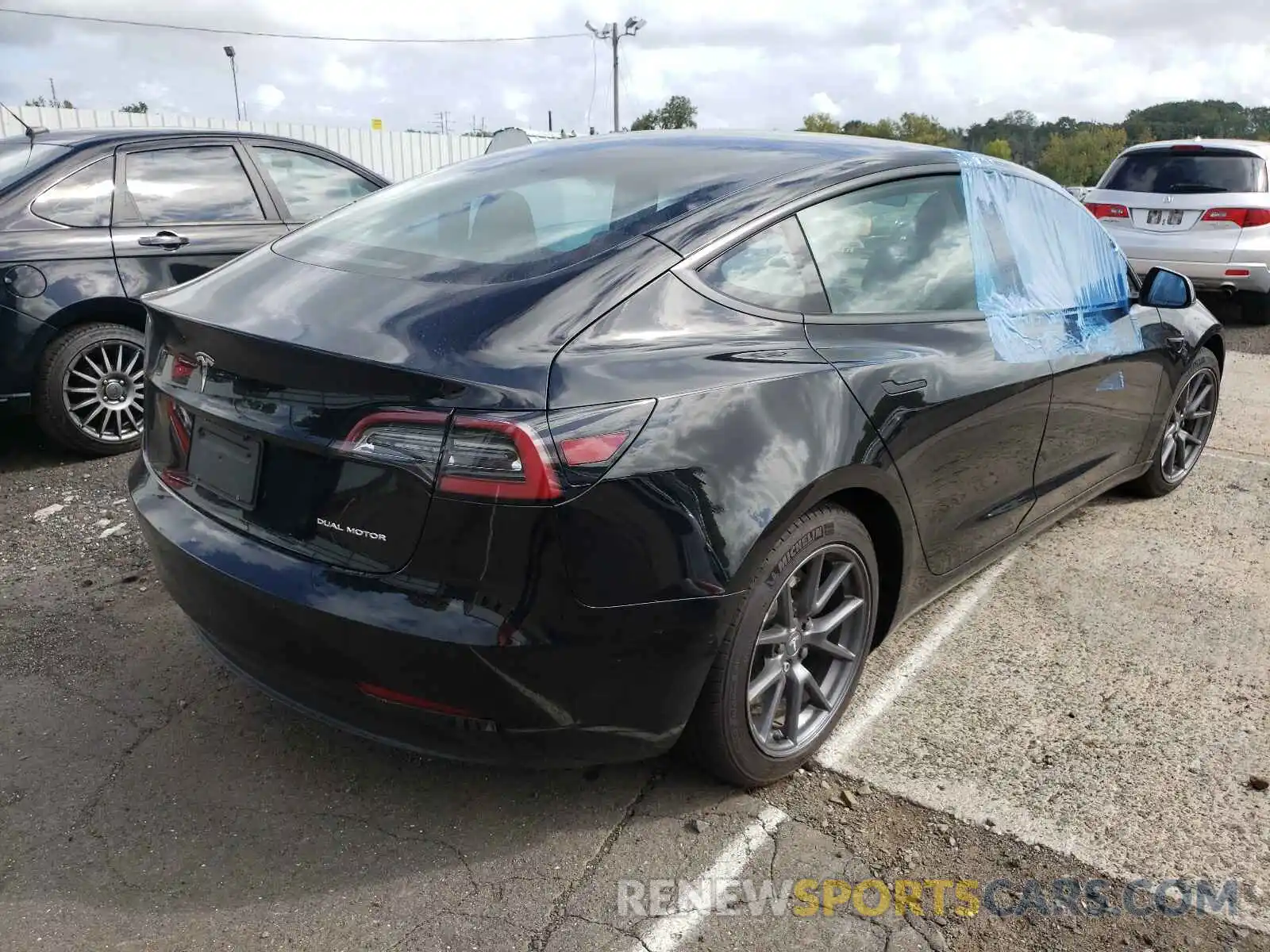 4 Photograph of a damaged car 5YJ3E1EB6MF848955 TESLA MODEL 3 2021