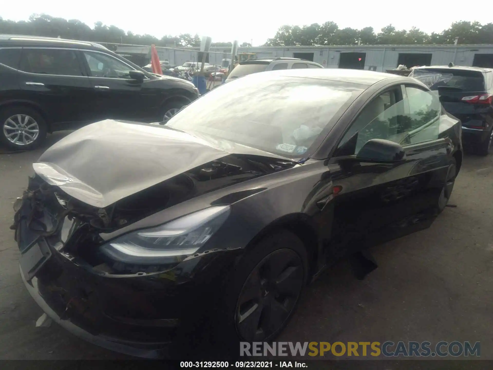 2 Photograph of a damaged car 5YJ3E1EB6MF858482 TESLA MODEL 3 2021