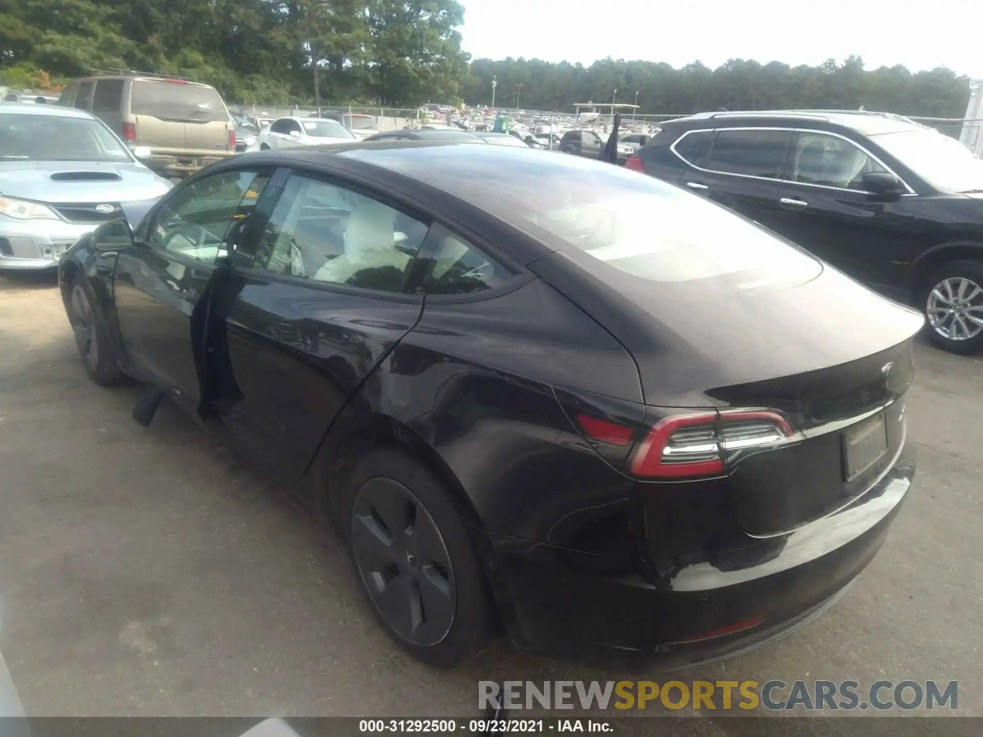 3 Photograph of a damaged car 5YJ3E1EB6MF858482 TESLA MODEL 3 2021