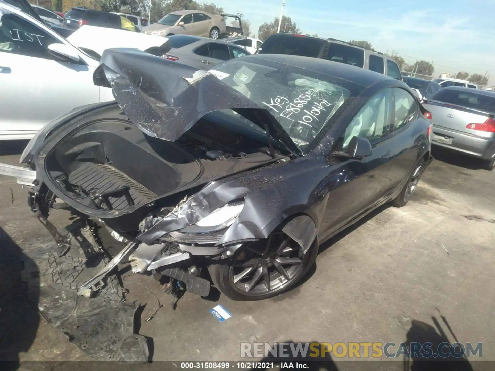 2 Photograph of a damaged car 5YJ3E1EB6MF868512 TESLA MODEL 3 2021