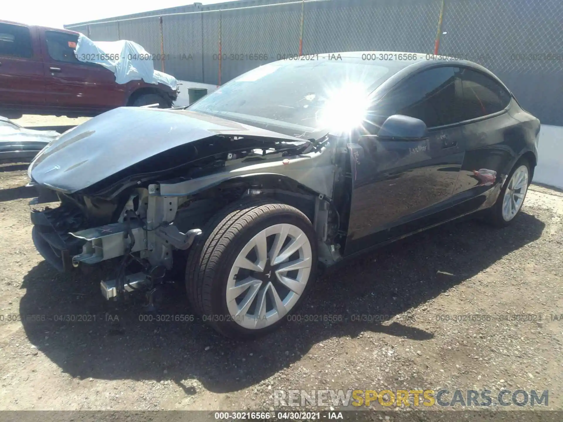 2 Photograph of a damaged car 5YJ3E1EB6MF870972 TESLA MODEL 3 2021