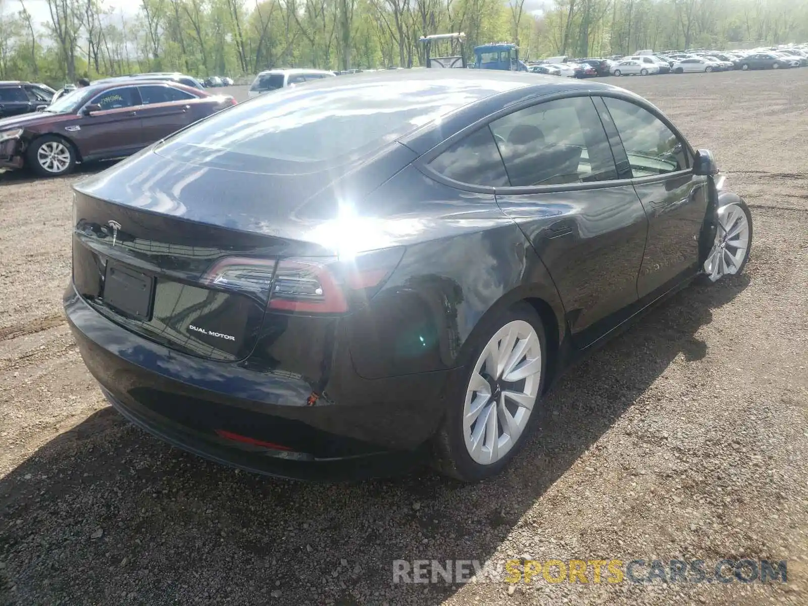 4 Photograph of a damaged car 5YJ3E1EB6MF901878 TESLA MODEL 3 2021