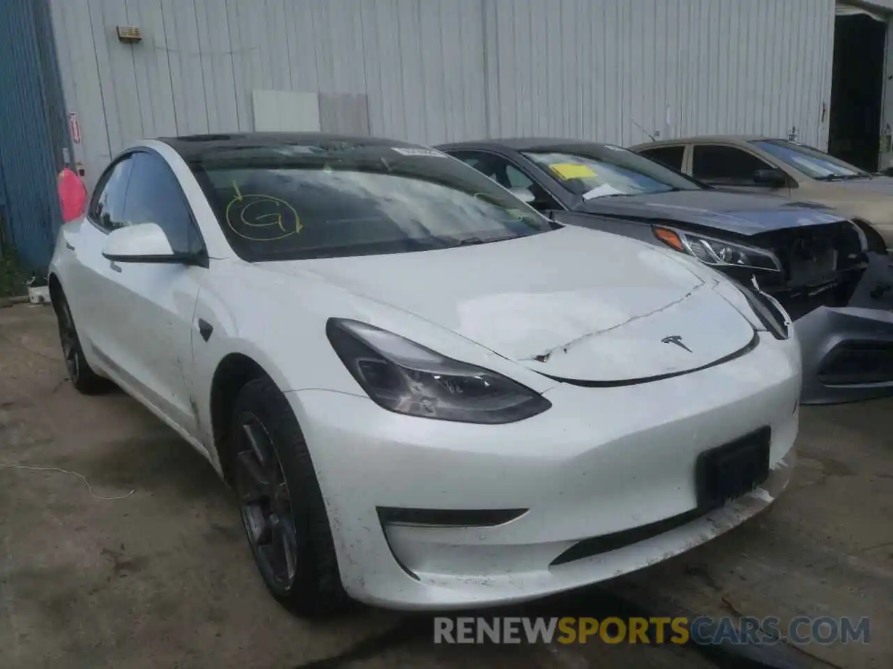 1 Photograph of a damaged car 5YJ3E1EB6MF974734 TESLA MODEL 3 2021