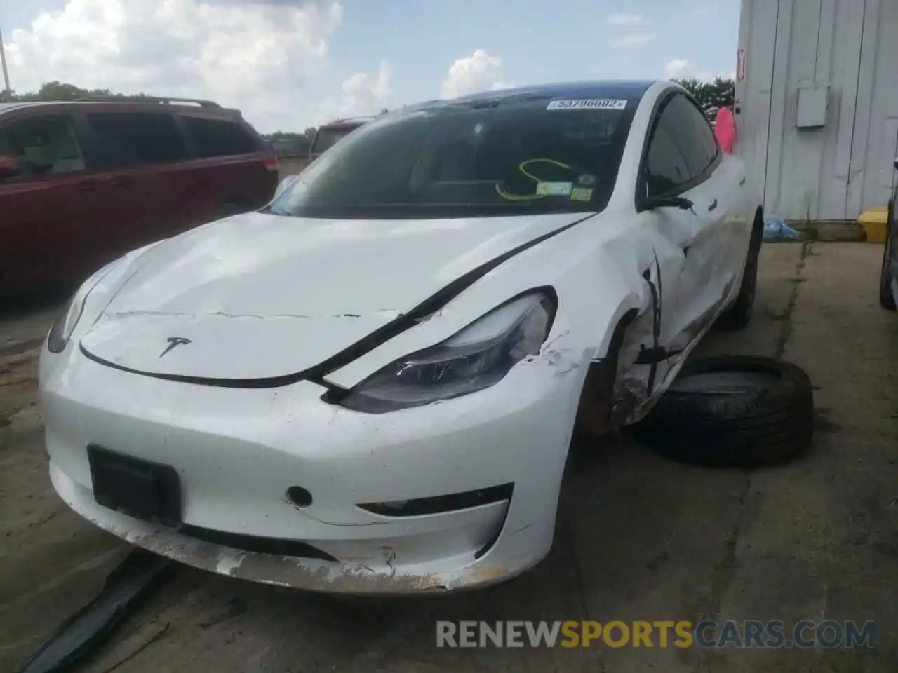 2 Photograph of a damaged car 5YJ3E1EB6MF974734 TESLA MODEL 3 2021