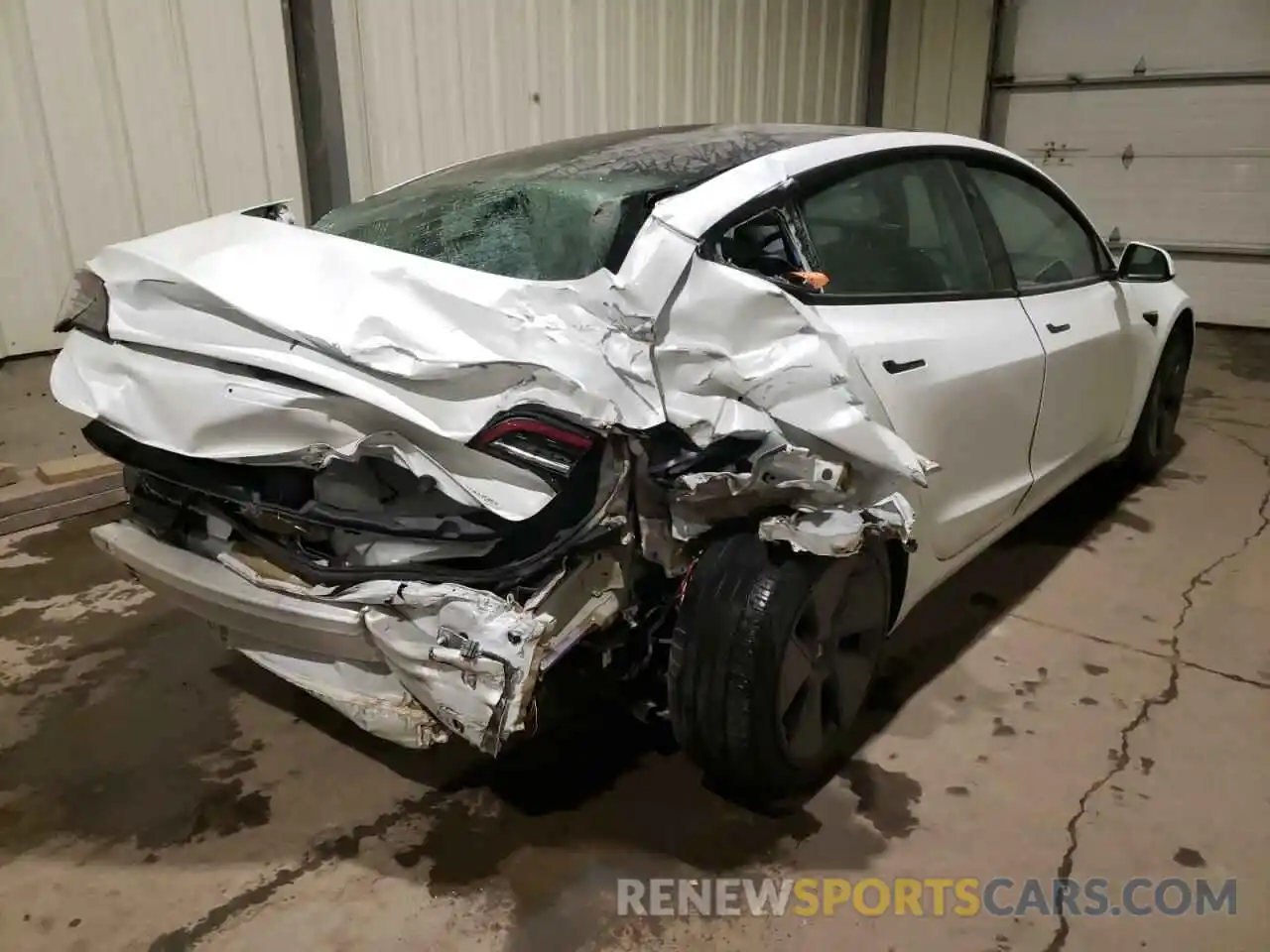 4 Photograph of a damaged car 5YJ3E1EB6MF979464 TESLA MODEL 3 2021