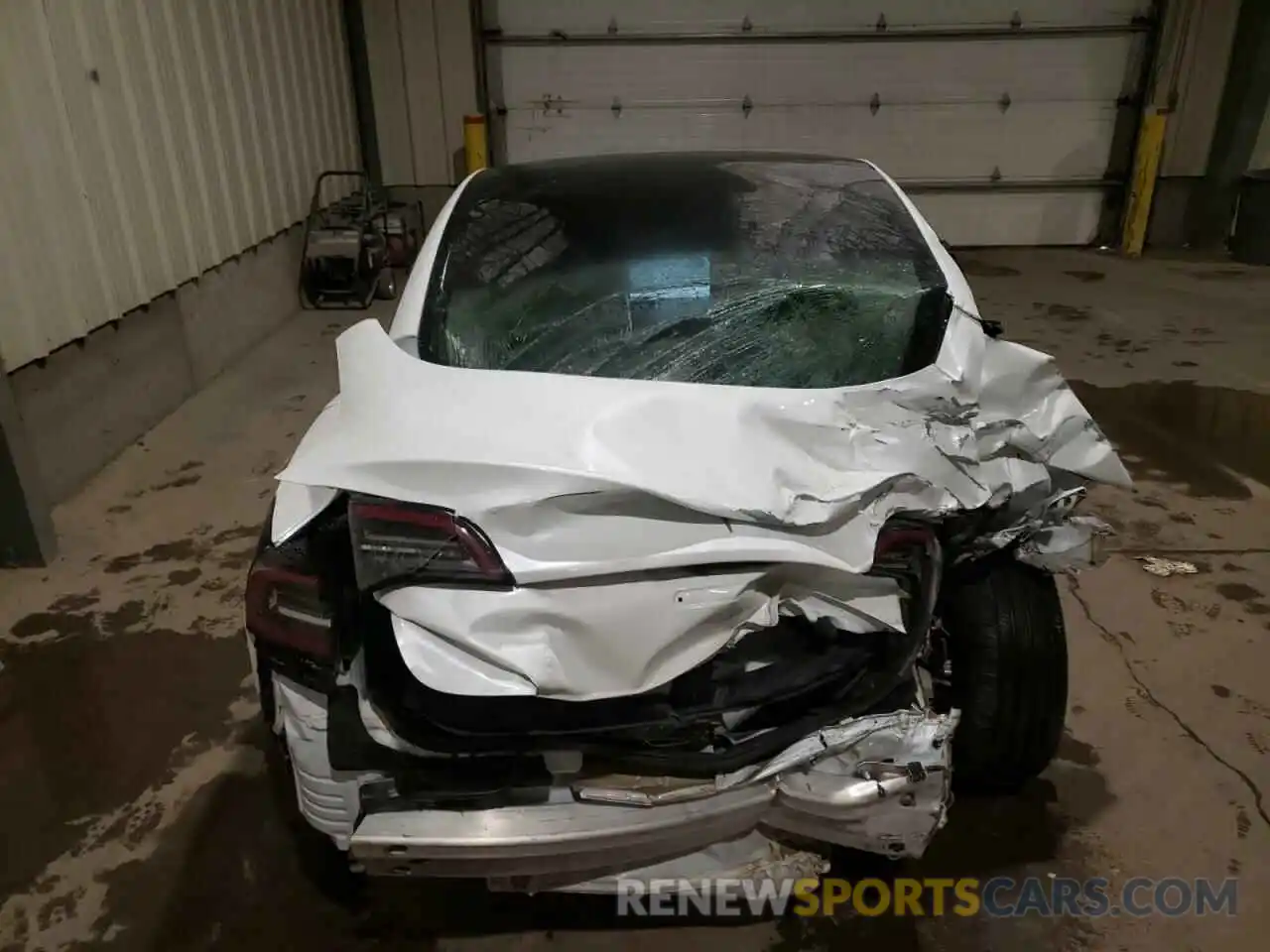 9 Photograph of a damaged car 5YJ3E1EB6MF979464 TESLA MODEL 3 2021