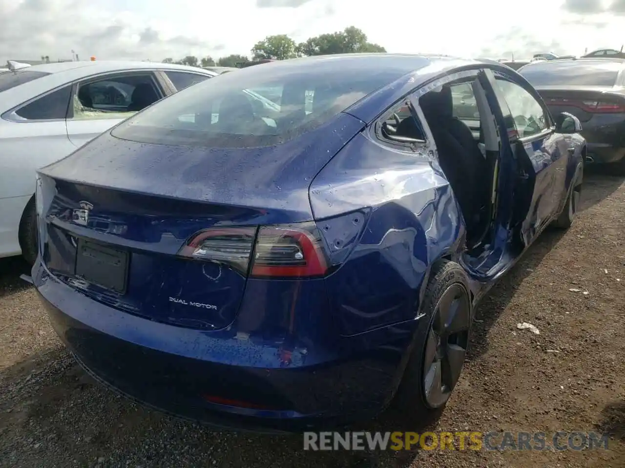 4 Photograph of a damaged car 5YJ3E1EB6MF979819 TESLA MODEL 3 2021