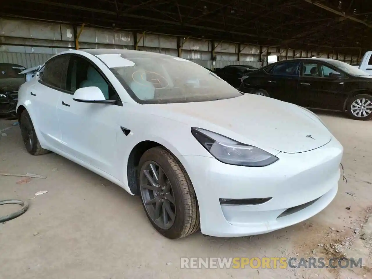 1 Photograph of a damaged car 5YJ3E1EB6MF999889 TESLA MODEL 3 2021