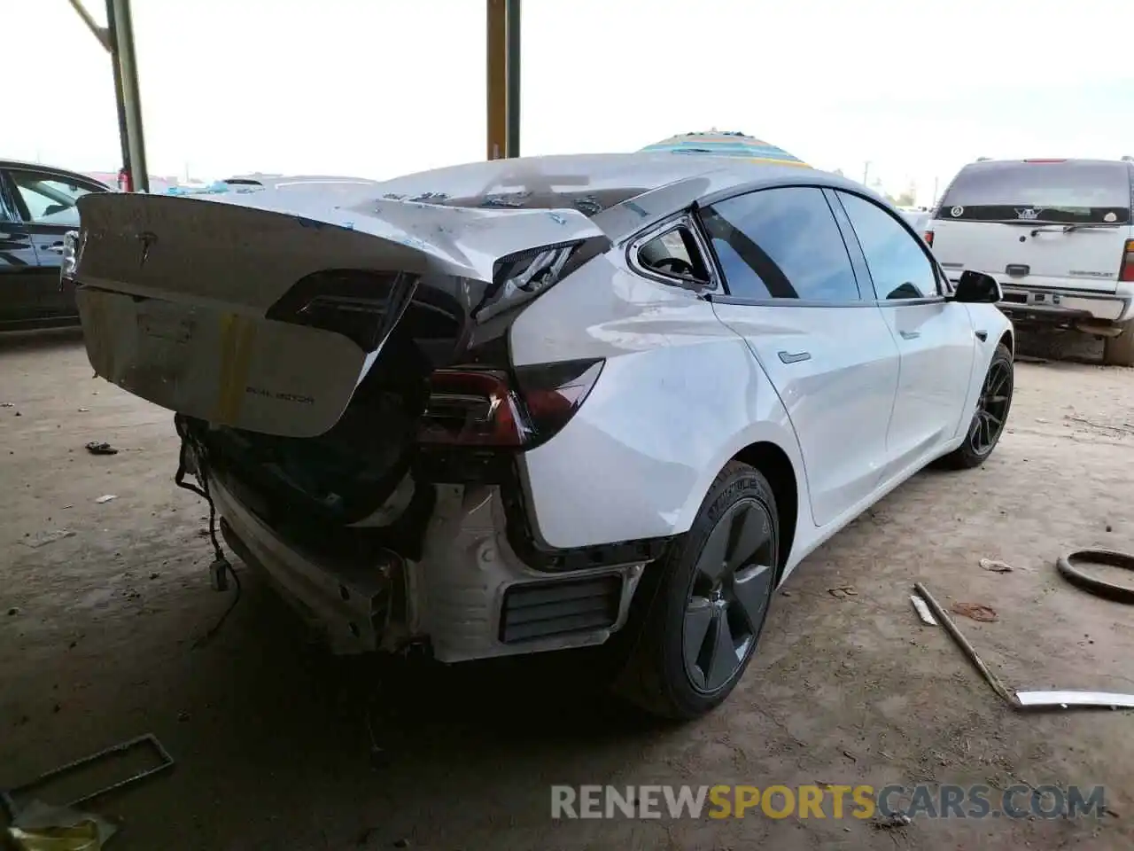 4 Photograph of a damaged car 5YJ3E1EB6MF999889 TESLA MODEL 3 2021