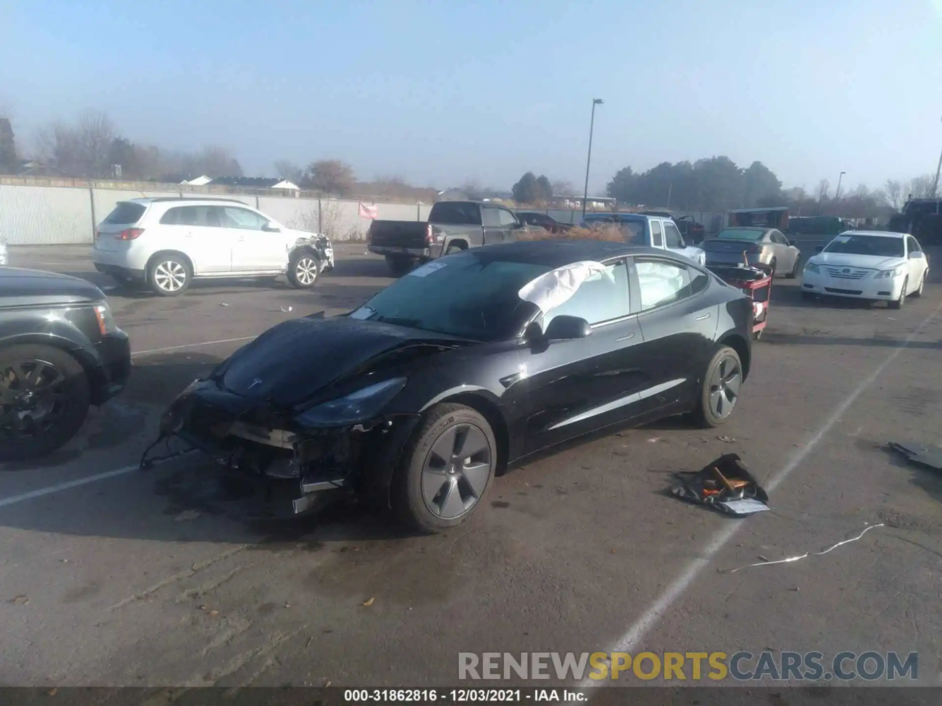 2 Photograph of a damaged car 5YJ3E1EB7MF012815 TESLA MODEL 3 2021