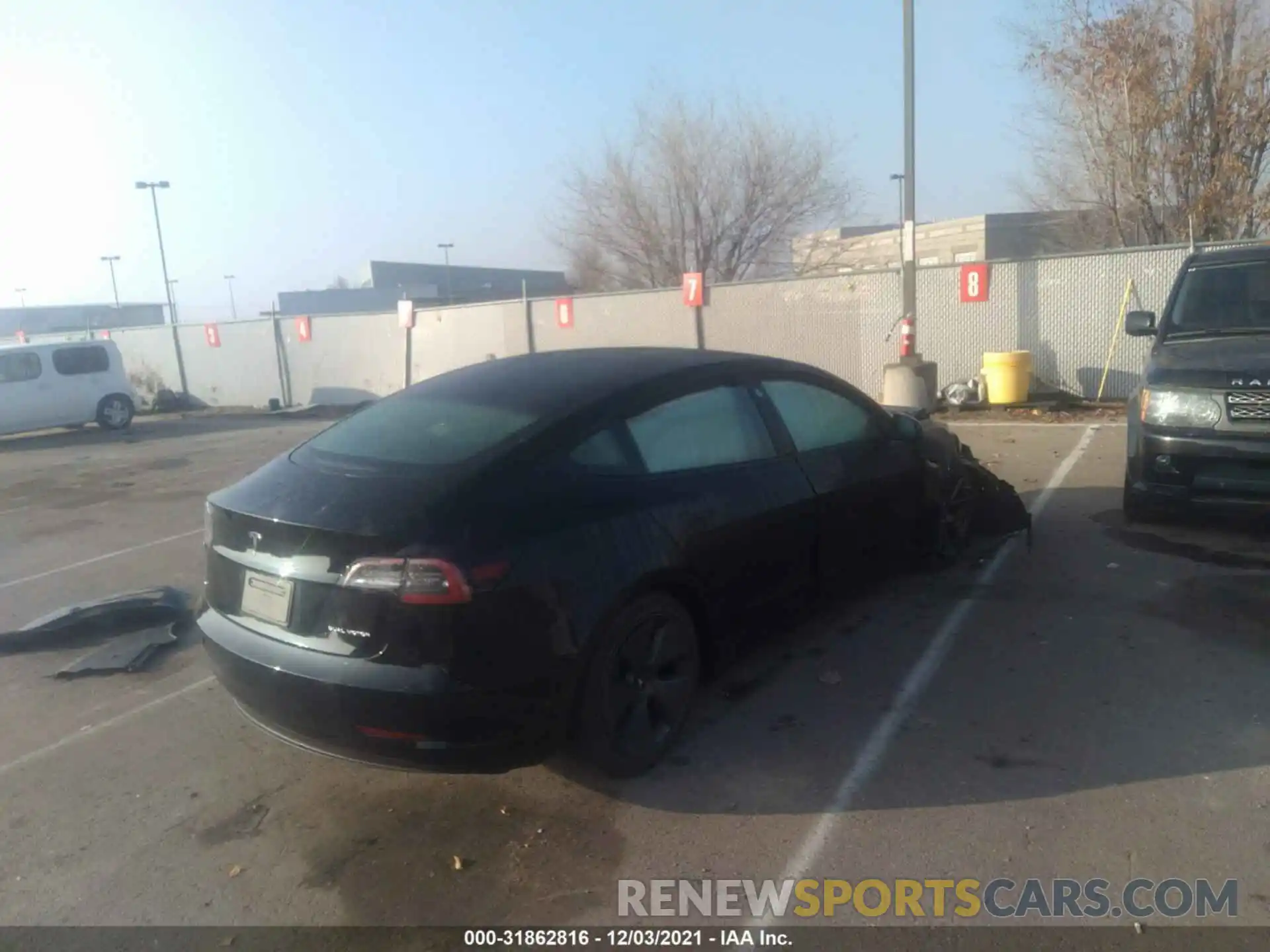 4 Photograph of a damaged car 5YJ3E1EB7MF012815 TESLA MODEL 3 2021