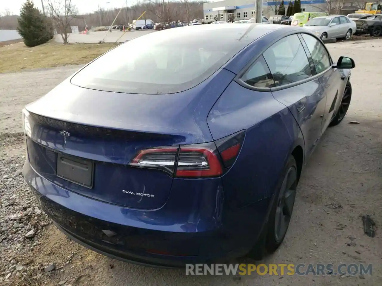 4 Photograph of a damaged car 5YJ3E1EB7MF019439 TESLA MODEL 3 2021