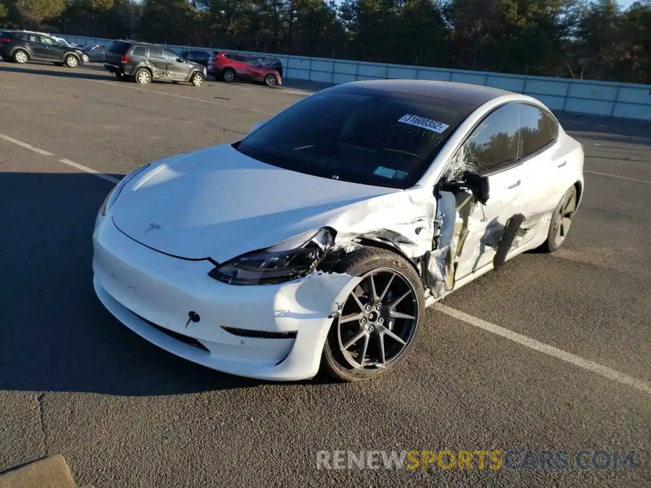 2 Photograph of a damaged car 5YJ3E1EB7MF034149 TESLA MODEL 3 2021