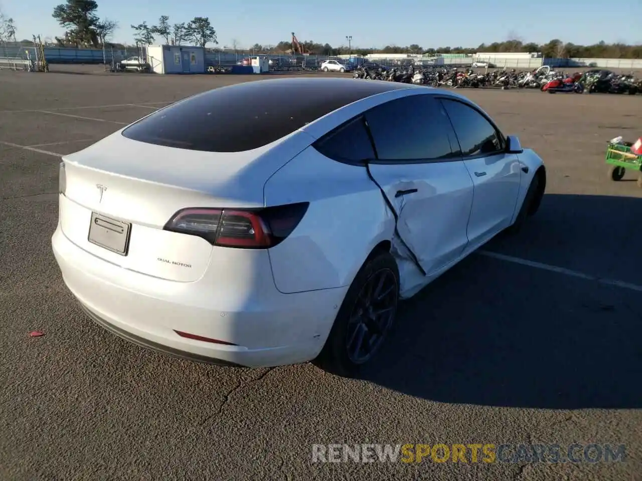 4 Photograph of a damaged car 5YJ3E1EB7MF034149 TESLA MODEL 3 2021