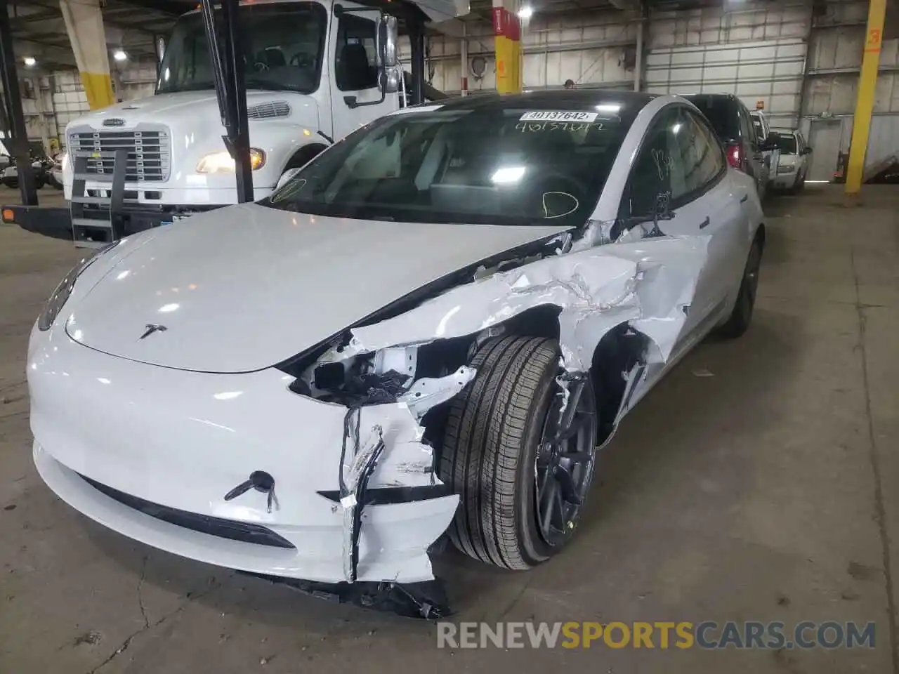 2 Photograph of a damaged car 5YJ3E1EB7MF066146 TESLA MODEL 3 2021