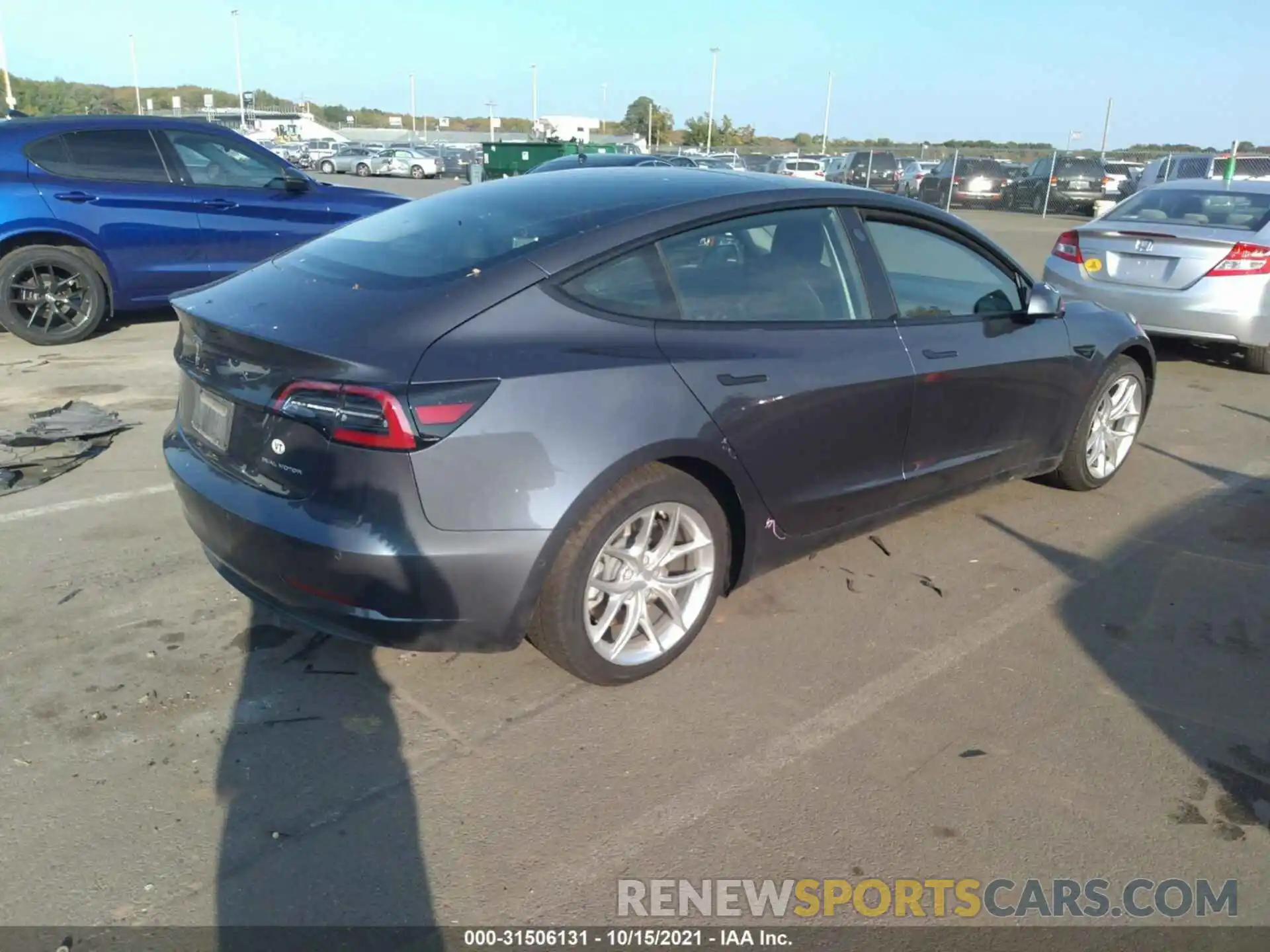 4 Photograph of a damaged car 5YJ3E1EB7MF850262 TESLA MODEL 3 2021