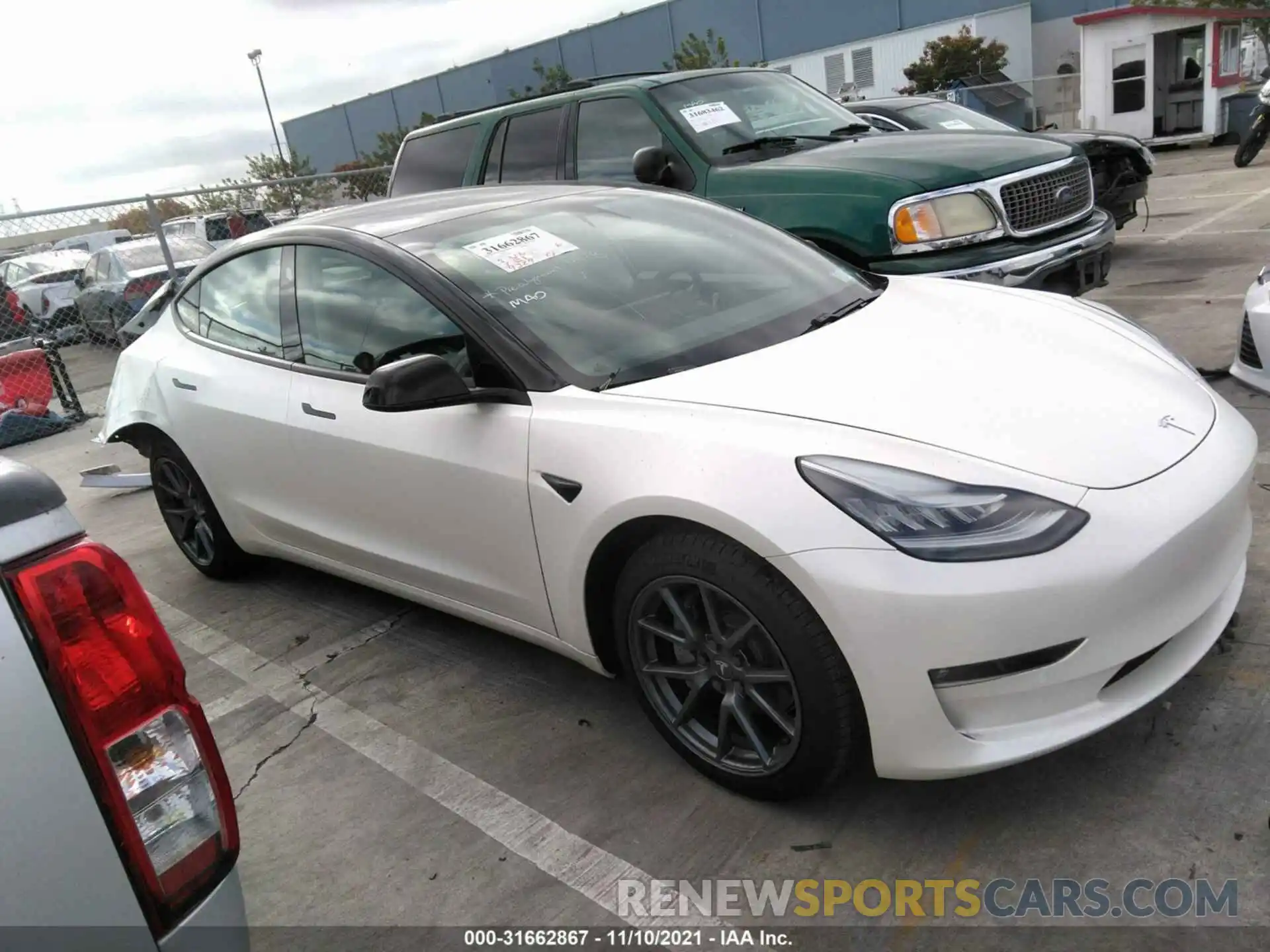 1 Фотография поврежденного автомобиля 5YJ3E1EB7MF852903 TESLA MODEL 3 2021