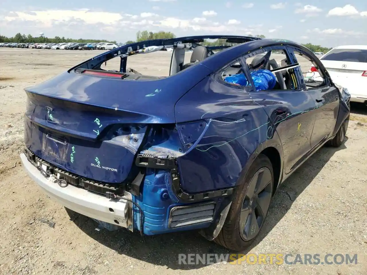 4 Photograph of a damaged car 5YJ3E1EB7MF858359 TESLA MODEL 3 2021