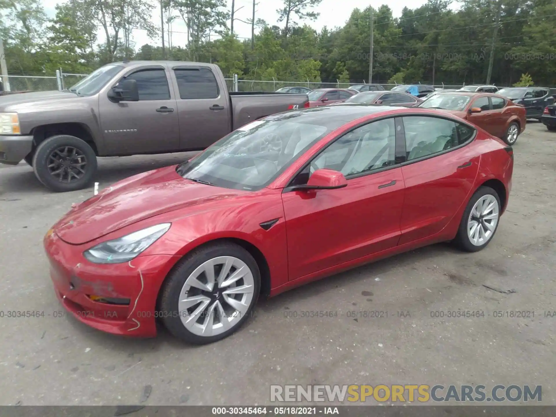 2 Photograph of a damaged car 5YJ3E1EB7MF862394 TESLA MODEL 3 2021