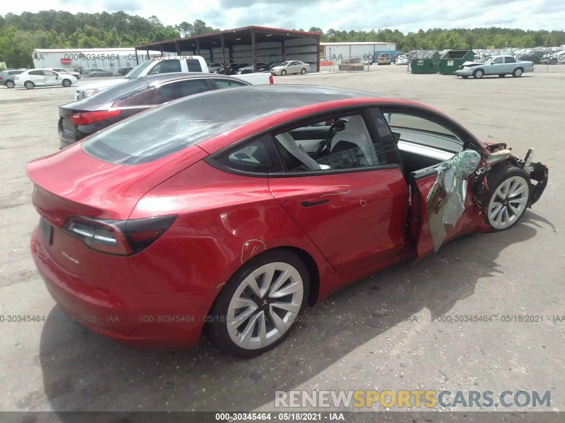 4 Photograph of a damaged car 5YJ3E1EB7MF862394 TESLA MODEL 3 2021