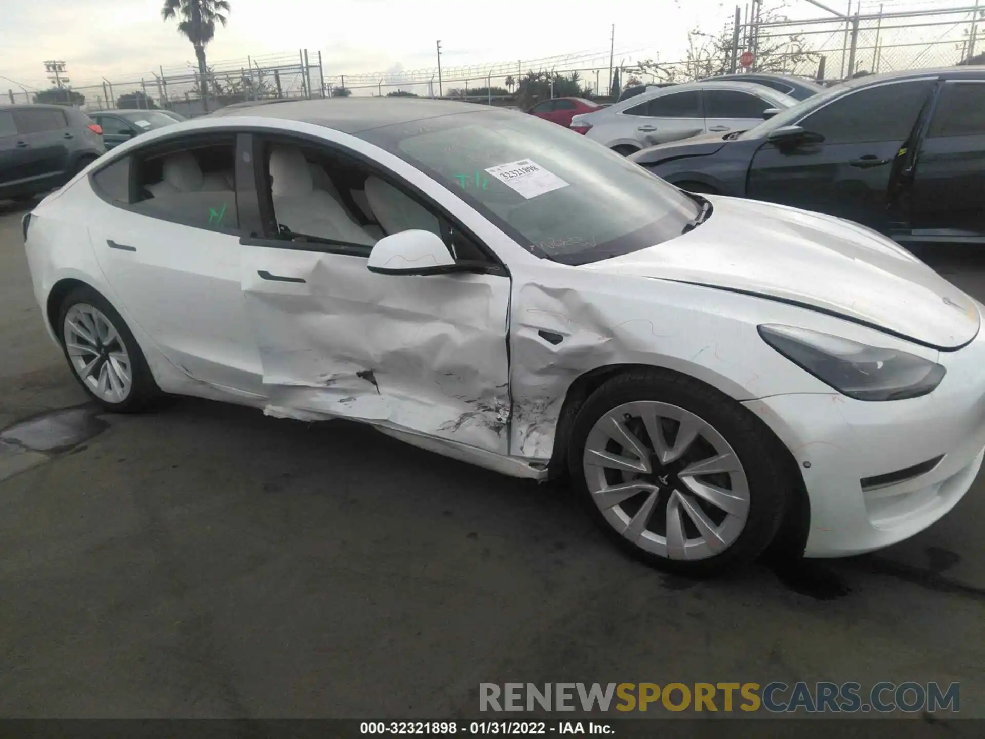 6 Photograph of a damaged car 5YJ3E1EB7MF868910 TESLA MODEL 3 2021