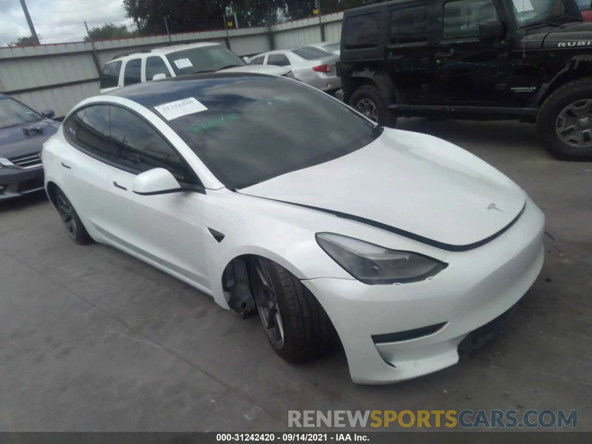 1 Photograph of a damaged car 5YJ3E1EB7MF869653 TESLA MODEL 3 2021