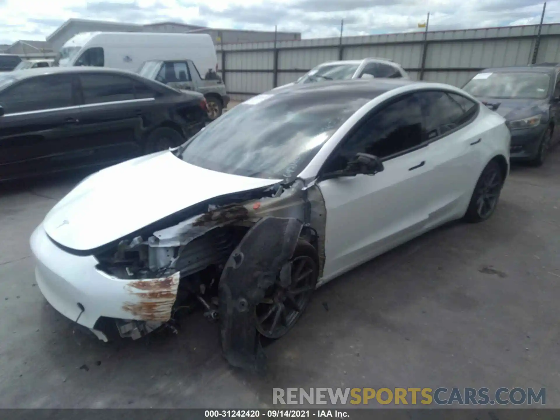 2 Photograph of a damaged car 5YJ3E1EB7MF869653 TESLA MODEL 3 2021