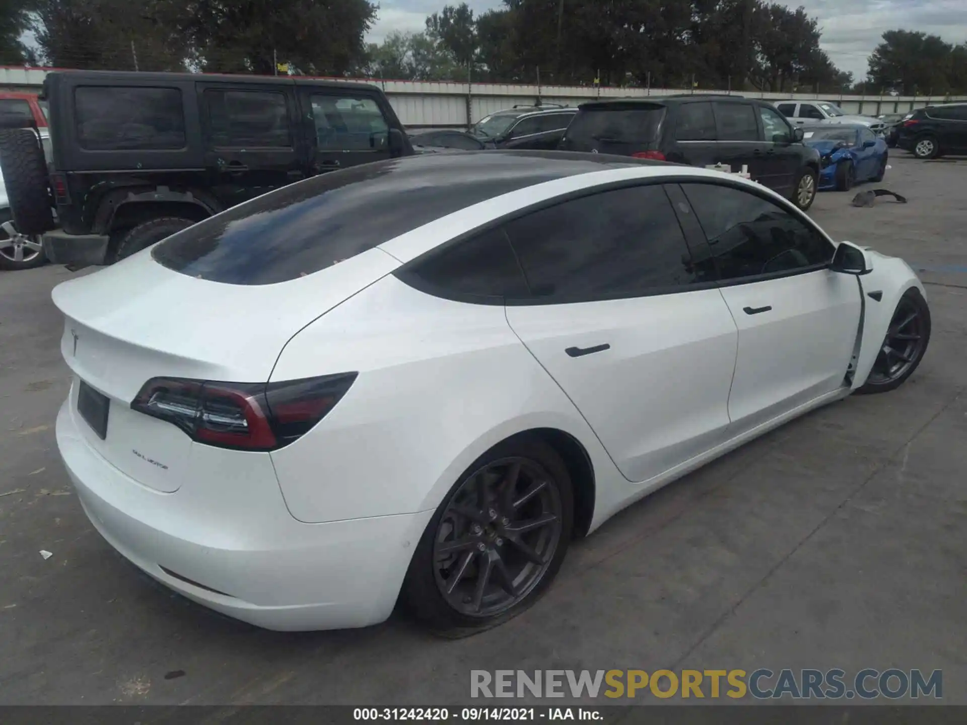 4 Photograph of a damaged car 5YJ3E1EB7MF869653 TESLA MODEL 3 2021