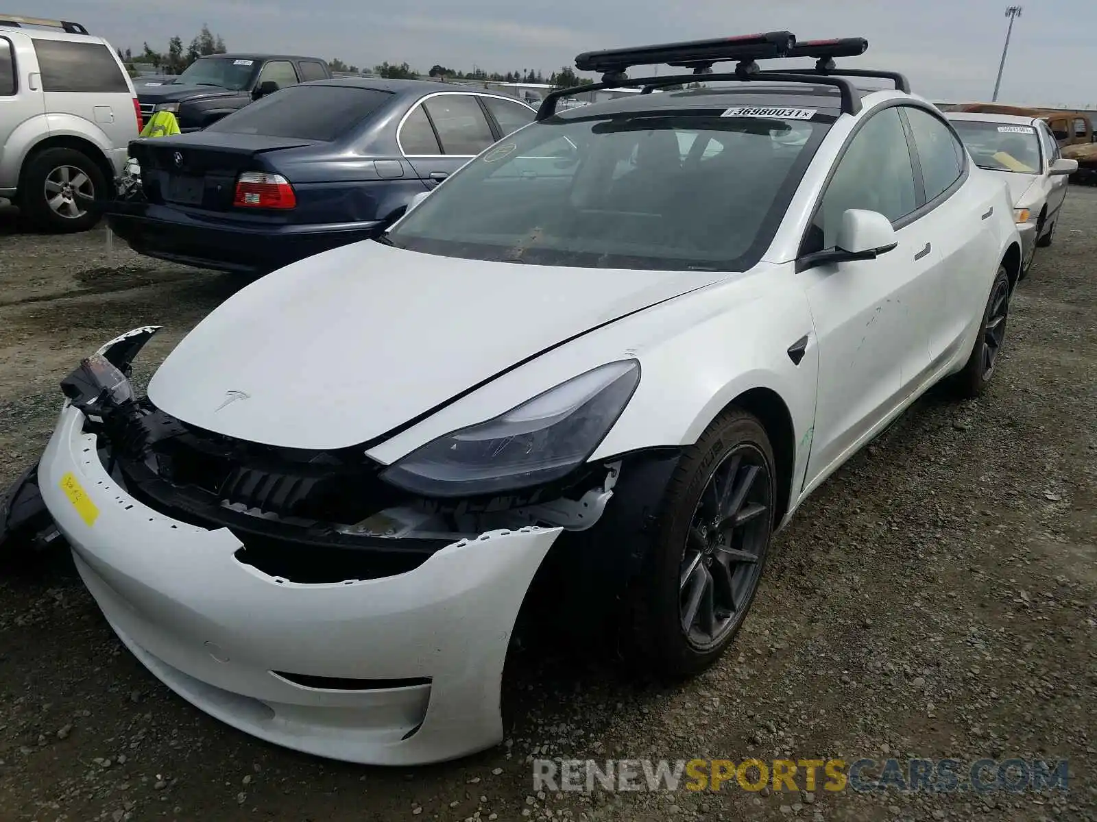 2 Photograph of a damaged car 5YJ3E1EB7MF878983 TESLA MODEL 3 2021