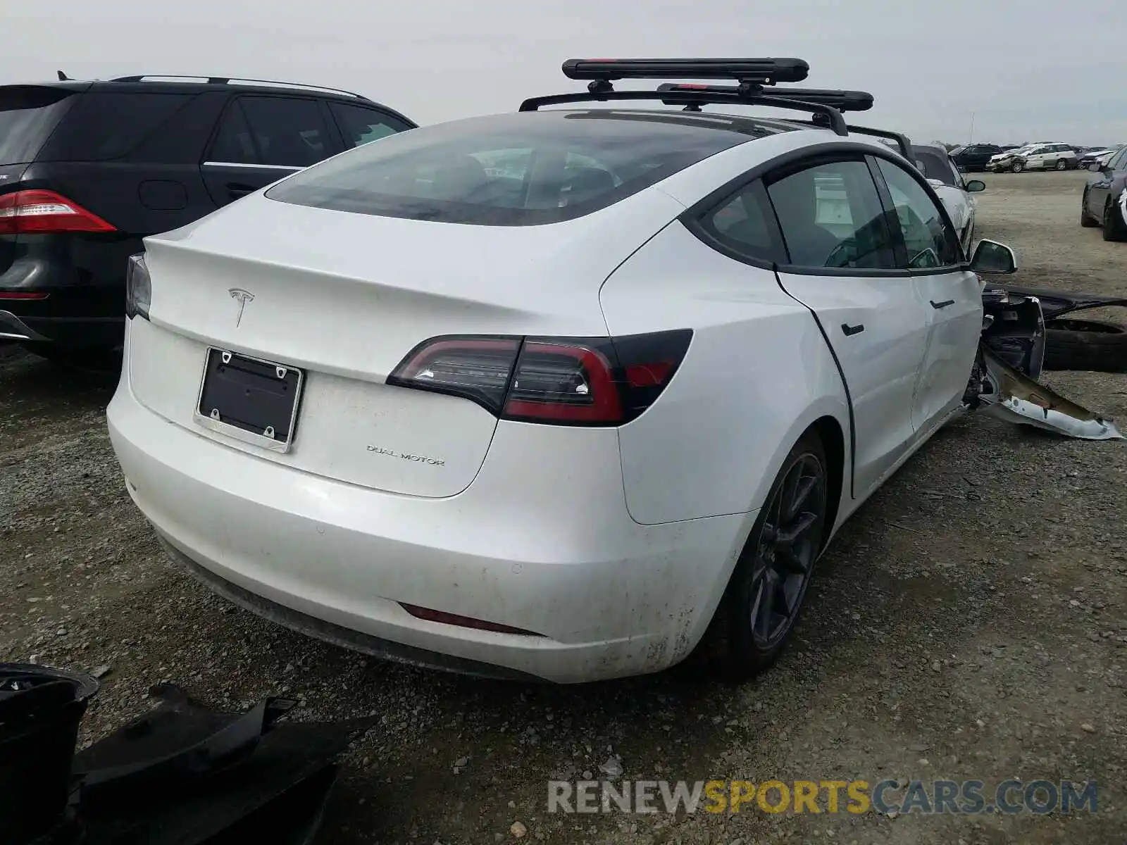 4 Photograph of a damaged car 5YJ3E1EB7MF878983 TESLA MODEL 3 2021